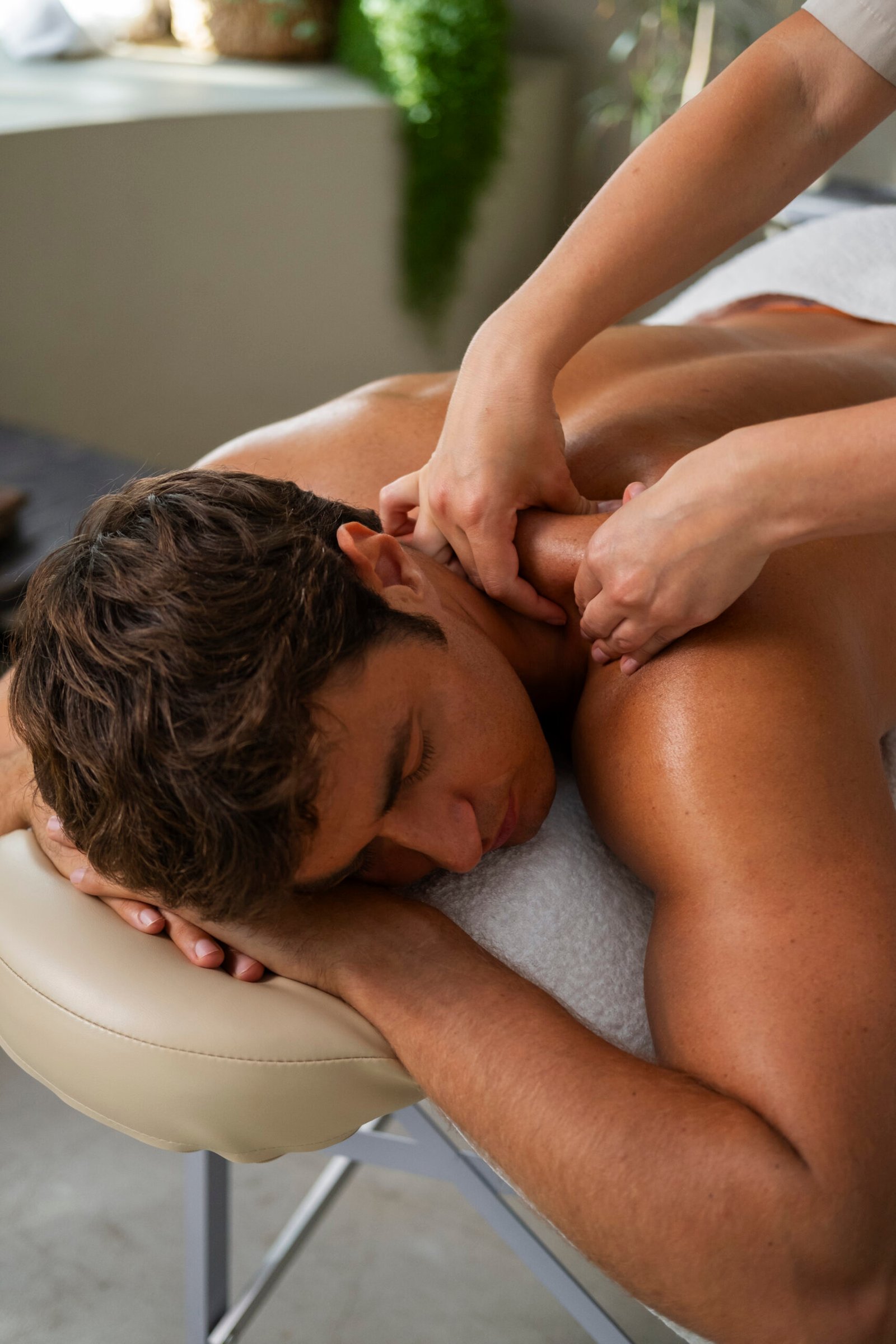 high-angle-man-relaxing-spa